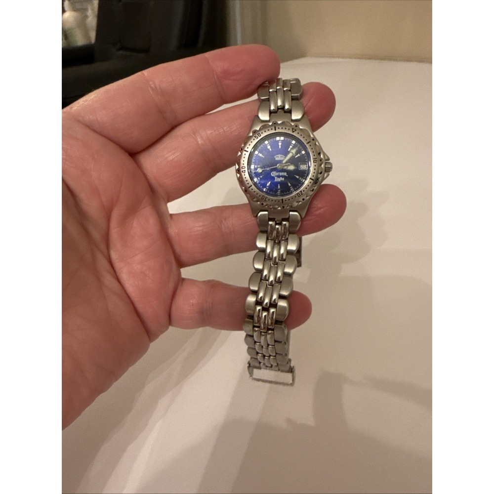 Fossil Blue AM-3099 Vintage Ladies Corona Light Watch Blue Dial Silver Tone